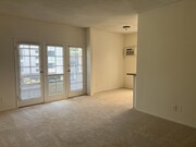 Unit Nº206 - Living Room with Large Private Balcony - 10964 Wellworth Ave Apartments