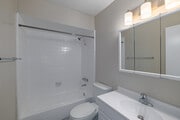 2BR, 1BA - 1,150SF - Bathroom - Camelot Apartments