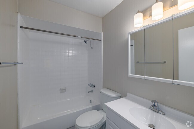 2BR, 1BA - 1,150SF - Bathroom - Camelot Apartments