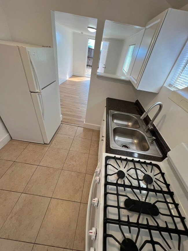 Photo - Private Detached House with Fenced Yard and Large Covered Carport