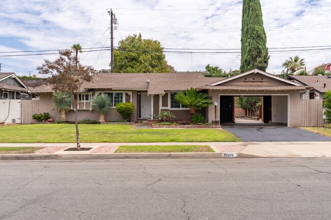 Photo - Charming Updated Home With Drive-Through Garage Access