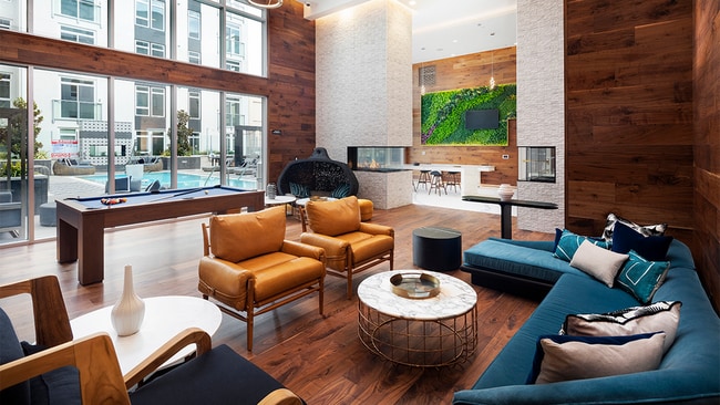 Clubroom with moss wall, HDTV and gaming areas - Modera Hollywood