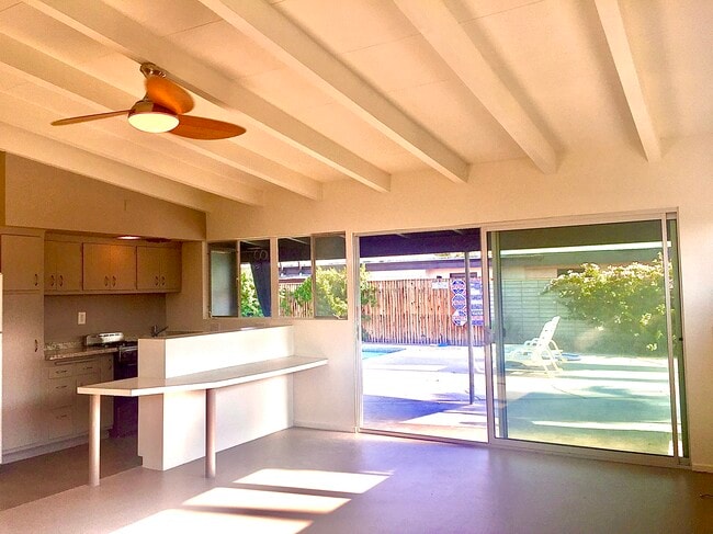 Vaulted ceilings with open floor plan and views over the pool. - 3715 E Calle de Ricardo Unit 3 Rental