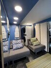 Stackable laundry with 2 fold out twin seats - 3003 Prospect Ave Apartments Unit The Airplant Place