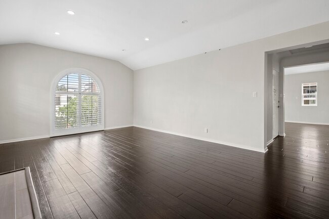 Living room leading to Dining room - 7930 W 4th St Unit 7930