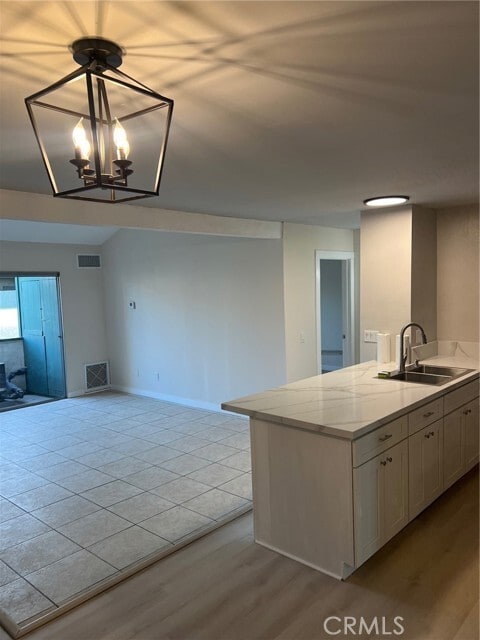 Building Photo - 15321 Santa Gertrudes Ave Unit J210