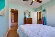 Photo - Stunning 2 bed 2 bath top floor condo in gated community with 2 covered parking spaces!