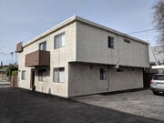 EXTERIOR REAR OF BUILDING - 5232 Wilkinson Ave Apartments Unit 2