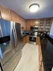 Full kitchen stainless appliances - 3030 Suncrest Dr unit 402 Apartment Unit 3030 Suncrest Dr. 402