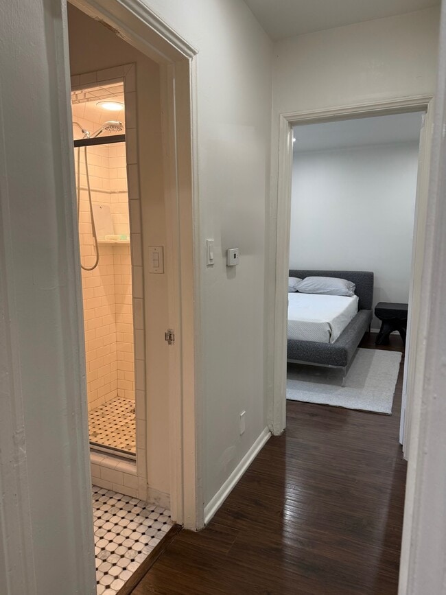 Hallway down to first bedroom and bathroom - 9933 Robbins Dr Unit 10