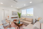 2BR, 2BA - 783SF - Living Room - Canopy North Park Apartments