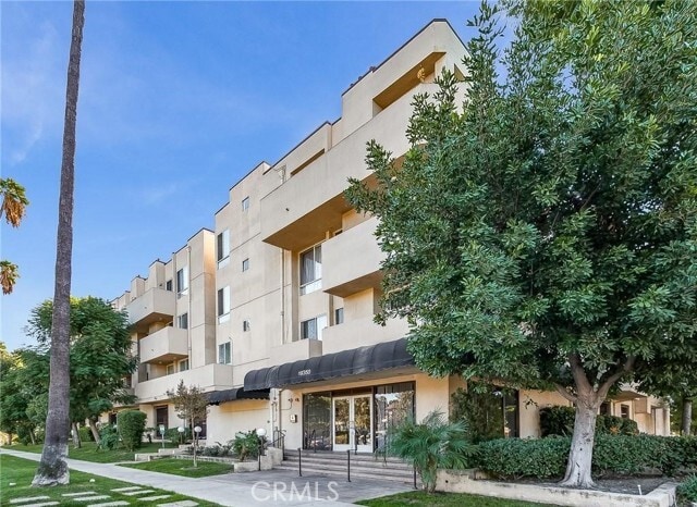Building Photo - 19350 Sherman Way Unit 124