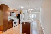 Kitchens include ample storage and cabinet space - 5550 Wilshire at Miracle Mile by Windsor Apartments