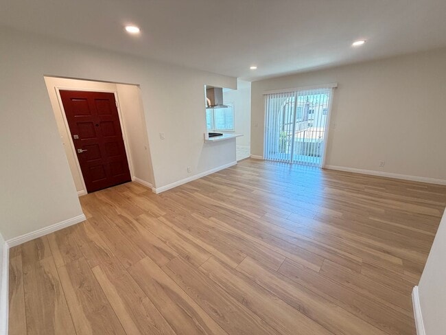 Photo - Completely Remodeled, Spacious 2 Bedroom Apartment For Rent w/ Parking! Unit E