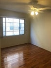 bedroom looking out window - 1237 N Brand Blvd Apartments Unit #1
