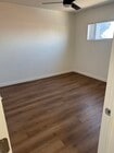 Bedroom 2 - New Flooring - 15015 Gramercy Pl Apartment Unit M