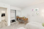 Bedroom with 2 twin beds at Nutwood East Apartments - Nutwood East Apartments