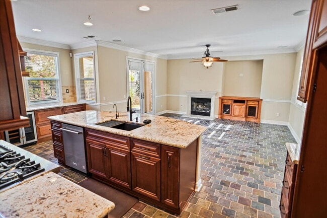 Photo - "Spacious 4-Bedroom Retreat with Cozy Fire...