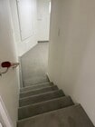 stairs down to bedroom - 305 Emerald St Unit 305