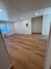 Main living area with new flooring - 4475 Dale Ave Unit Westwood Village