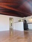 living room/kitchen - 4415 154th St Apartment