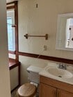 Bathroom with storage - 1001 N Sierra Bonita Ave Apartments Unit 1/2