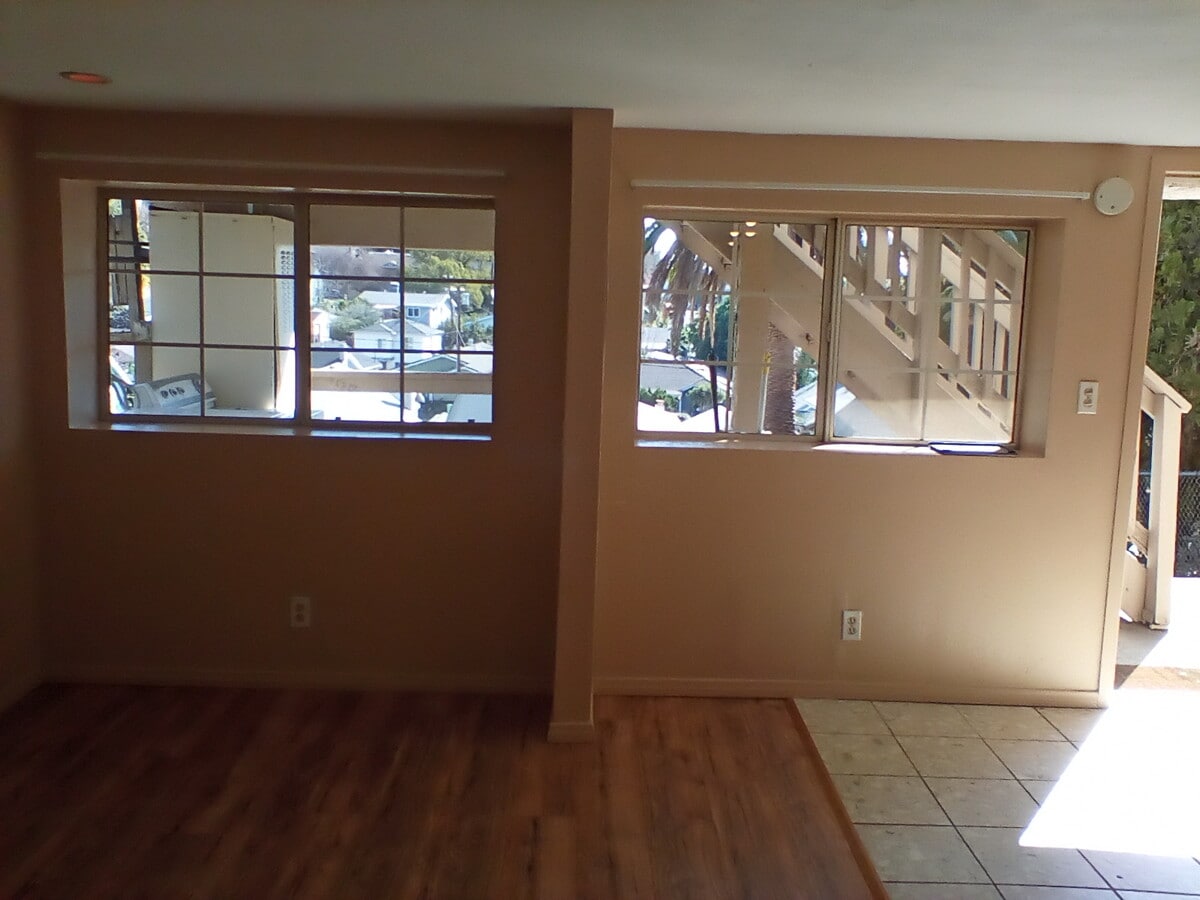 View of backyard through windows. - 6200 St Albans St Unit Studio