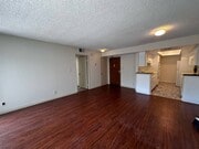 Living room to kitchen - 121 S Swall Dr Apartments