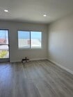 Living room looking west - 21104 Donora Ave Unit C