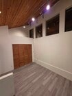 Dining room with closet and elevated storage area (main floor) - 2635 Hollyridge Dr