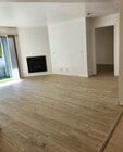 Spacious living room with private balcony - 7640 Oso Ave Unit Oso Ave