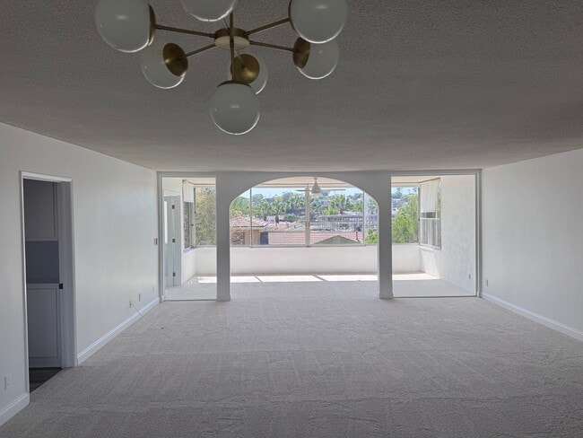 Building Photo - 8701 Delgany Ave Unit 204