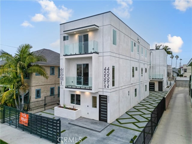 Building Photo - 4559 W 18th St Unit 1/4