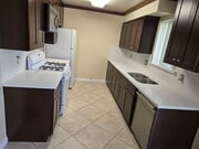 Unit 4 New Kitchen - 15017 Dickens St Apartments
