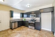 Photo - 1642 W 65th Pl House