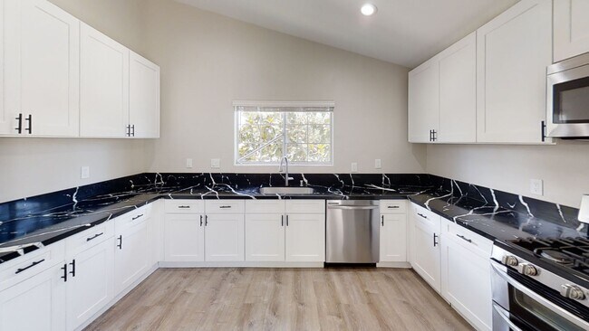 Photo - Newly Renovated! 4BD + Attached Studio