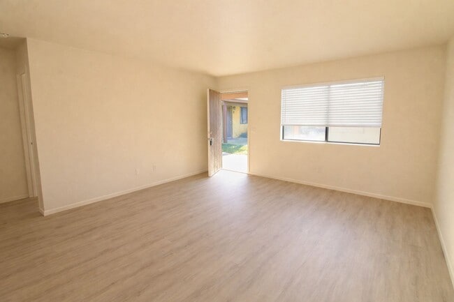 Photo - Recently Renovated, Single-Level 2-Bedroom Apartment with Small Fenced Yard. Unit O