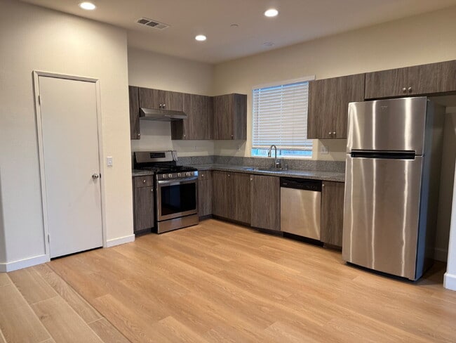 Photo - Solor Savings! Beautiful modern interior with open floorplan for entertaining. Large backyard w...