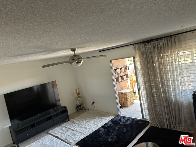 Photo - 6600 Warner Ave Unit 84