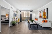 2BR, 2BA - 1038SF - Living Room - Broadway Palace Apartments