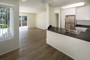 Kitchen, living, and dining area - eaves San Marcos Apartments