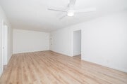 1BR, 1BA - 750SF - Living Room - Sunset West