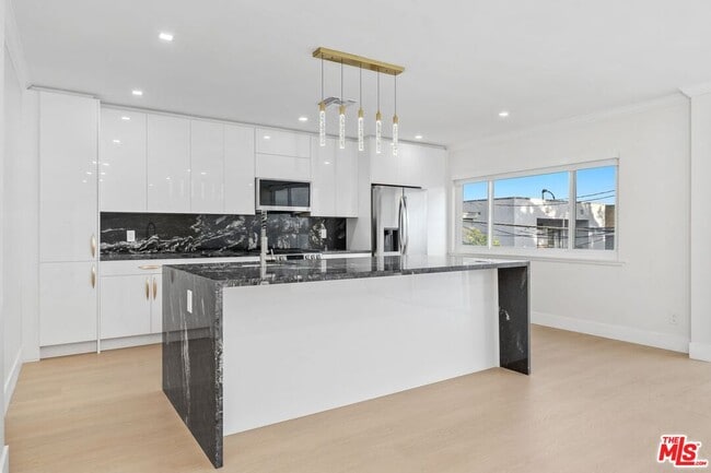 Building Photo - 1223 23rd St Unit C