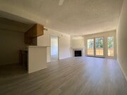 1BR, 2BA - 750 - Living Room - A & J Investments