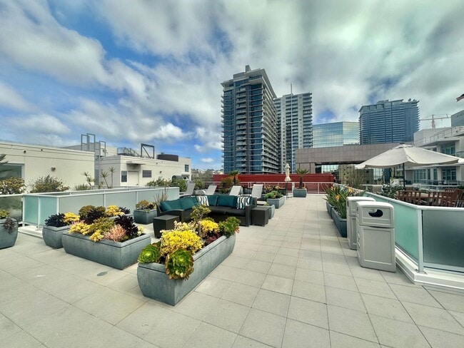 Photo - Little Italy 1BD/1BA Condo w/ Pool, Jacuzzi, BBQ, Balcony, Rooftop Terrace, In-unit Laundry, Subt... Unit 211