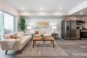 2BR, 2BA - 1,108SF - Living / Dining Room - The Secret Apartments
