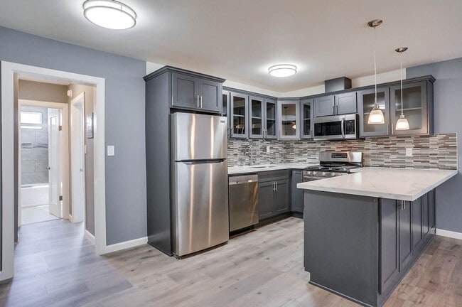 Building Photo - 6325 8th Ave Unit 11