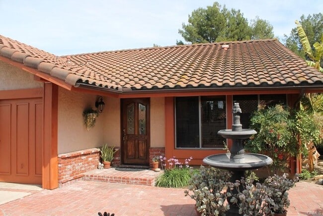 Building Photo - This incredible 4 bedroom single level home with private GATE  entry