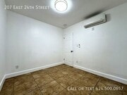 Photo - 207 E 24th St Unit 1