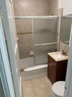 Bathroom also a separate vanity above the toilet - 11280 Morrison St Apartments